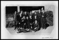 Photograph: Group of Men by House
