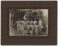 Primary view of [Photograph of Men at Entrance of Texas Cotton Palace]