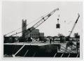 Photograph: [Construction of Jay-Rollins Library with Two Cranes]