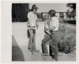 Photograph: [Photograph of Two Students on Steps]