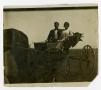 Photograph: [Couple in a Buggy]