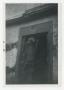 Photograph: [Photograph of Soldier in Doorway]