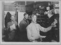 Photograph: [Photograph of Clerks in Post Office]