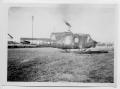 Photograph: [Army Helicopter on a Field]