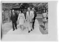 Photograph: [Lady Bird and Lyndon Johnson on Sidewalk]
