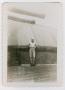 Primary view of [Photograph of Herman Stoner by the U.S.S. Texas' Guns]