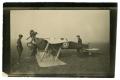 Photograph: [Photograph of an Overturned Airplane]