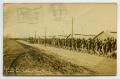 Postcard: [Postcard of Soldiers Marching at Camp MacArthur]