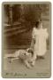 Photograph: [Portrait of Elmer Josephine Wheatly with the Family Dog]