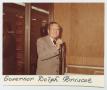 Photograph: [Photograph of Governor Dolph Briscoe at Microphone]