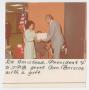 Photograph: [Photograph of Mrs. Briscoe Receiving Gift from Mr. Amistead]