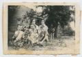 Photograph: [Photograph of Group of Children and Teenagers in Yard]