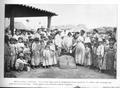 Photograph: [Photograph of a large group of men, women, and children gathered aro…