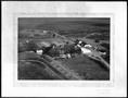 Photograph: [Aerial photograph of the George Ranch house and ranch site]