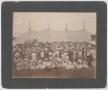 Photograph: [Photograph of a Group in Front of a Big Tent]