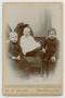Photograph: [Photograph of Three Young Boys Sitting]