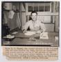Photograph: [Photograph of Major C. P. Oleson at his Desk]