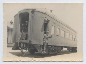 [Photograph of a Soldier Waving on a Train]